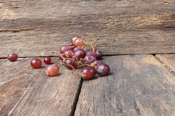 Grape red fresh on wooden table background — Stock Photo, Image