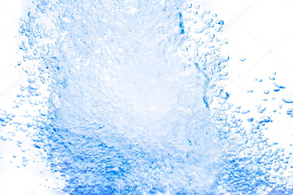 Water splash blue, show the motion with bubbles of air, on white background