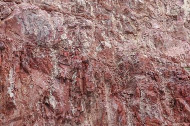 Stone cliff dağ dokusu, kaya zemininin yüzey uçurumu.