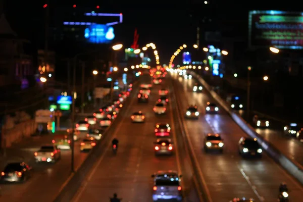 Abstract wazig bokeh in stad nacht kleurrijke mooie verkeer in Bangkok Thailand, met kopie ruimte — Stockfoto