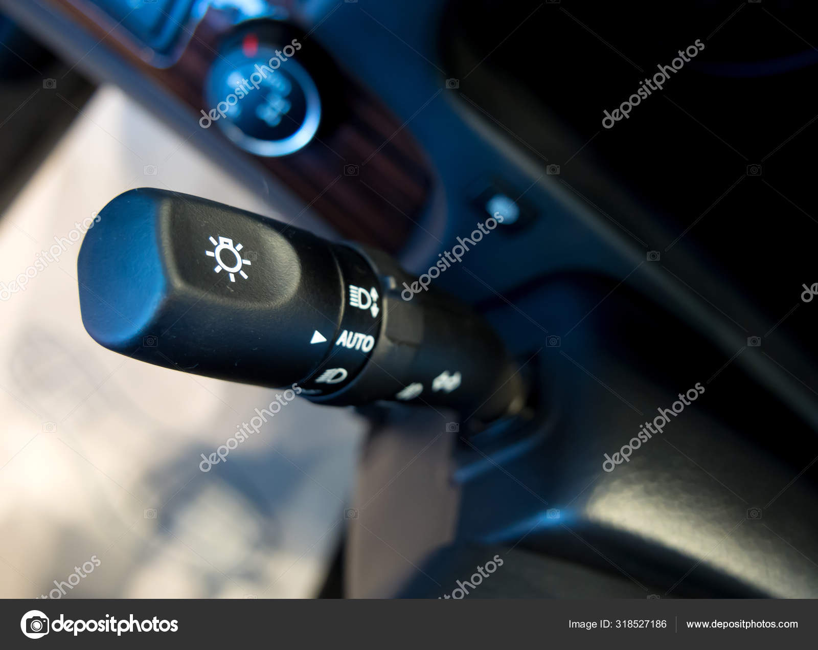 https://st3.depositphotos.com/6712124/31852/i/1600/depositphotos_318527186-stock-photo-steering-column-switch-car-headlight.jpg