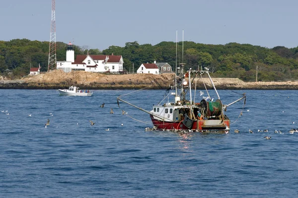 Fishing Trawler Approaching Lighthouse in Massachusetts — Stock Photo, Image