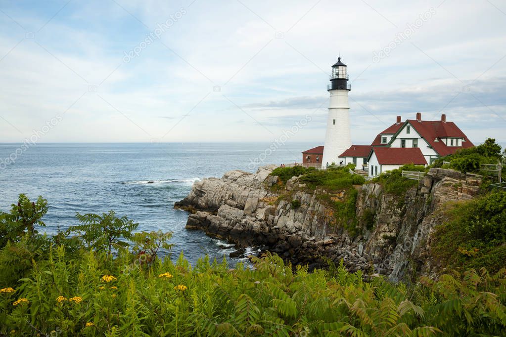 Maine Lighthouse Over Rocky Cliffs 