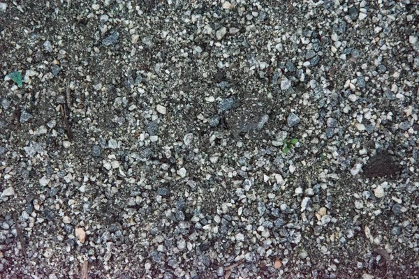 Małe kamienie, zmiażdżony kamień. Tło drobnego kamienia granitowego — Zdjęcie stockowe