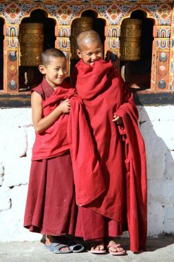 PARO, BHUTAN - NOVEMBER06,2012 : Unidentified smiling young monk clipart