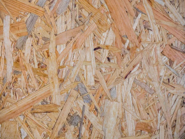a fragment of a wall of pressed wood chips