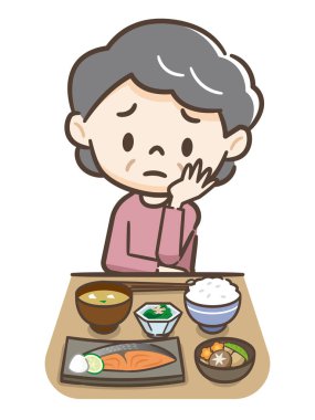 Yaşlı kadın iştahsız iç çekiyor.