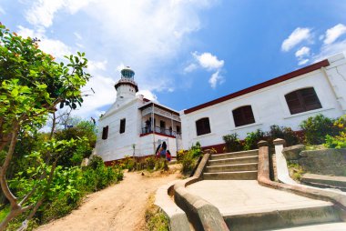 Cape Bojeador Lighthouse, Burgos, Ilocos Norte, Philippines. clipart
