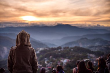 Sunrise watching at Mines View Park, Baguio, Philippines clipart