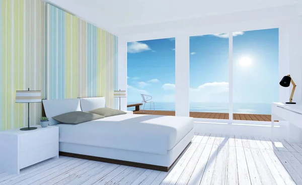 Witte en gezellige minimale slaapkamer interieur met uitzicht op zee in de zomer — Stockfoto