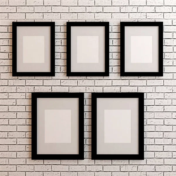 Picture frames on white wall — Stock Photo, Image
