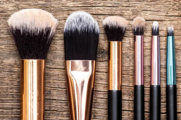 Set Kuas Makeup Pada Latar Belakang Kayu Tampilan Atas Tampilan — Stok Foto