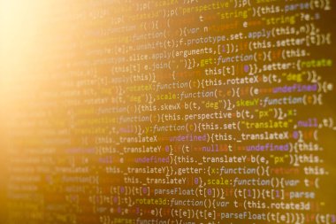 Minificated web geliştirme javascript koduna yakın çekim günbatımı ışınları