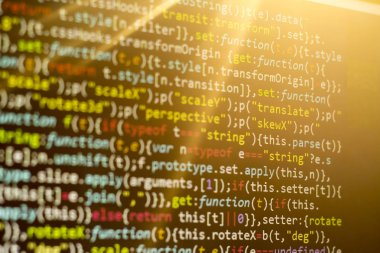 Minificated web geliştirme javascript kodu günbatımı ışınları. Web geliştirici çalışma alanı. Soyut bilgi dijital teknoloji modern arka plan.