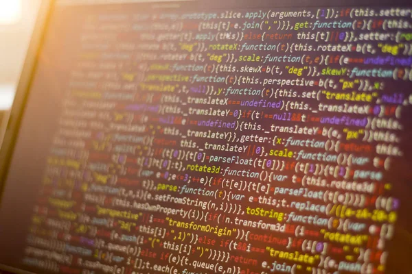 Web ontwikkeling javascriptcode Html5. Abstracte moderne informatie-technologie. Netwerk hacken. Lijnen van minificated Js code. Scherm van webontwikkelaar. — Stockfoto