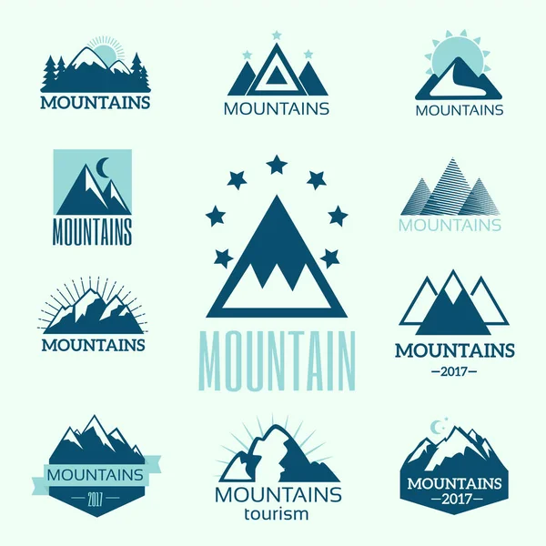 Vector set of mountain exploration vintage emblems and rock silhouette design elements — Stock Vector