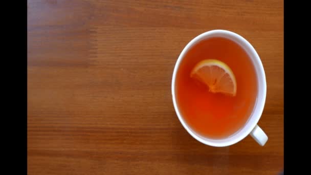 Cup tea with lemon — Stock Video