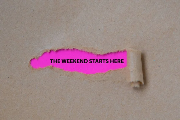 The Weekend Starts Here word written under torn paper