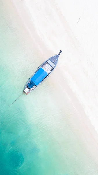 Aerial view of long tail boat is float on the emerald sea at Ao — Stock Photo, Image