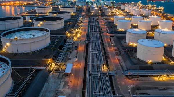 Gas storage tank, Oil storage tank, Aerial view oil and gas storage at night.