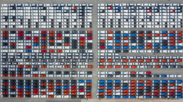 Aerial view new cars export terminal, New cars waiting for import export at deep sea port.