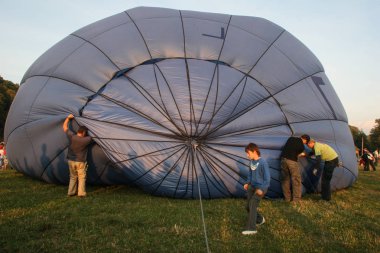 Campul Cetatii, Mures county, Romania, September 27, 2009: People participate at the Hot Air Balloons Festival in Campul Cetatii, Romania. 