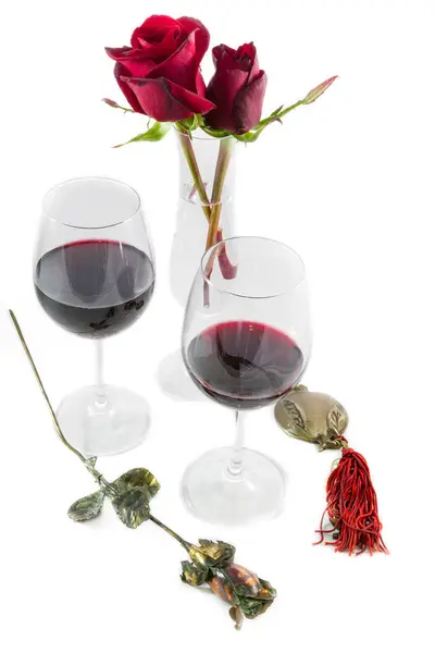 Roses Red Wine Glasses Pomegranate on white Valentines Day compo — Stock Photo, Image