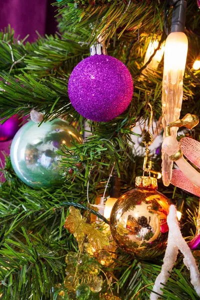 Christmas Tree decorated in a purple theme close-up — ストック写真