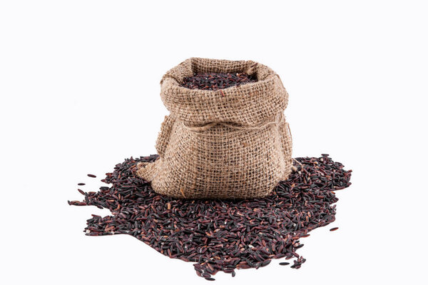 Riceberry rice in sacks on a white background