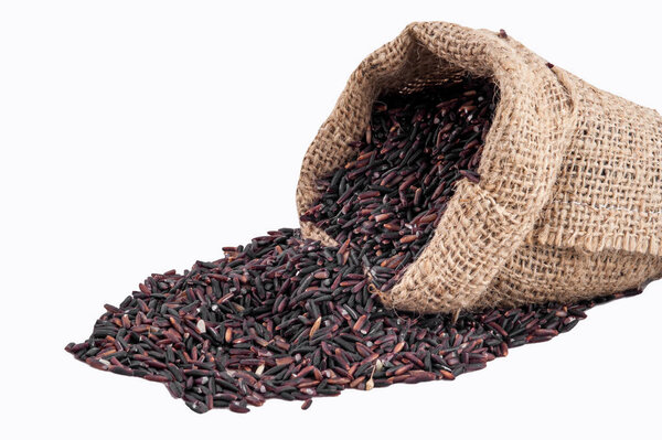 Riceberry rice in sacks on a white background