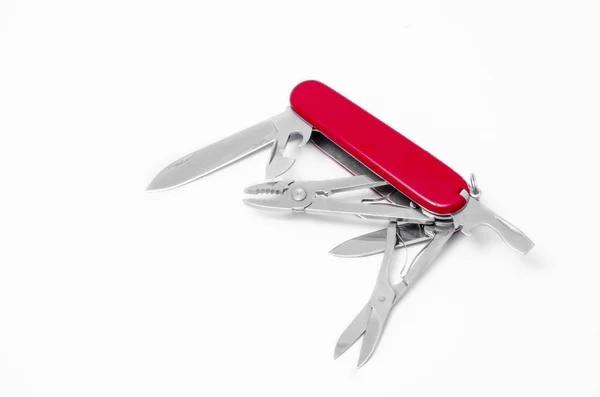 Cuchillo rojo multi-herramienta, aislado sobre fondo blanco —  Fotos de Stock