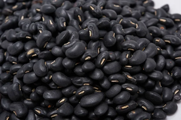 Primer plano de la semilla de frijol negro como fondo — Foto de Stock