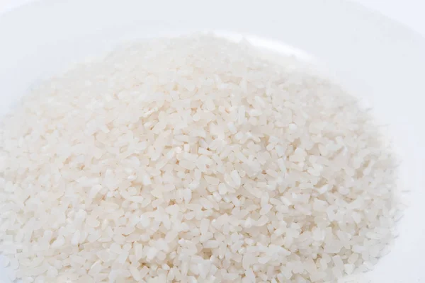 Arroz branco, grão de arroz longo natural para fundo e textura — Fotografia de Stock