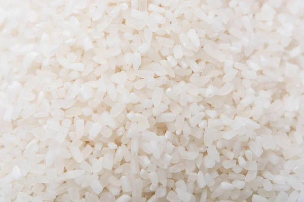 Biały ryż, naturalny ryż długo ziarna na tło i tekstura — Zdjęcie stockowe