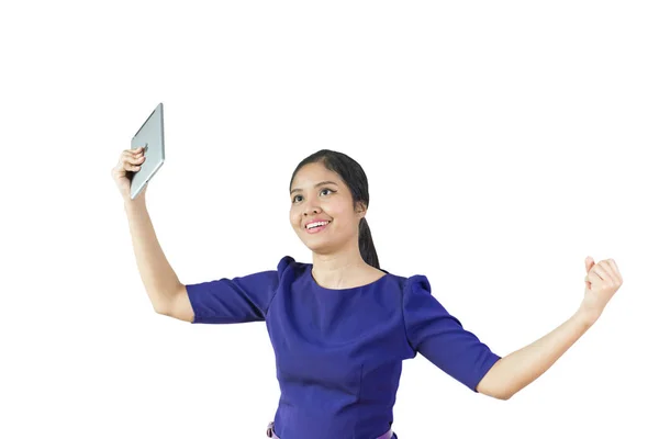 Jovem asiático mulher com feliz expressão com levantou punhos sobre branco fundo — Fotografia de Stock