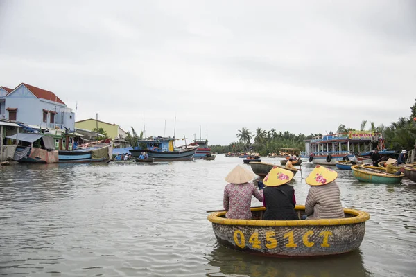 HOI AN,VIETNAM-December 9,2019: Tourists enjoy round basket boat Made of bamboo is a unique Vietnamese at Cam thanh village.