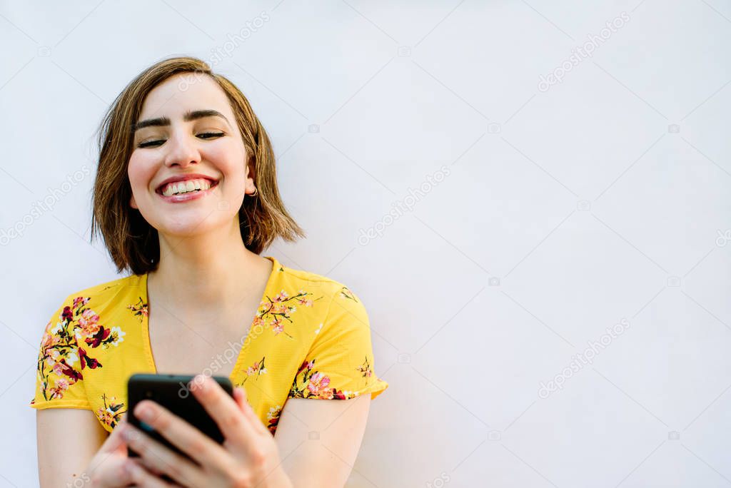 smiling woman with mobile