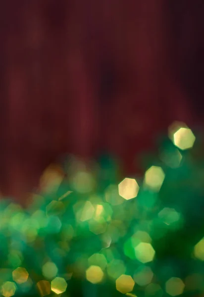 Christmas brown background with green bokeh — Stock Photo, Image