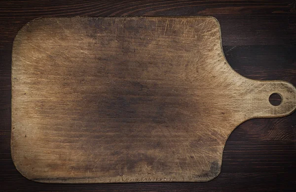 Old grunge wooden cutting kitchen desk board — Stock Photo, Image