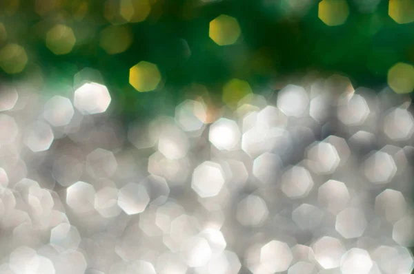 Abstract blurred background with silver and green bokeh — Stock Photo, Image