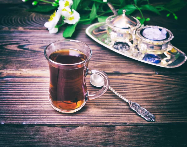 Black tea in a glass Turkish glass — Stock Photo, Image
