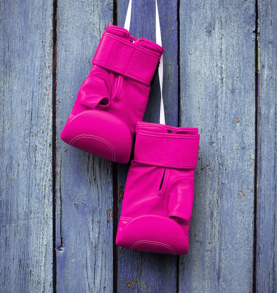 pair of pink gloves for kickboxing