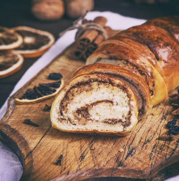 baked roll with cinnamon and nuts