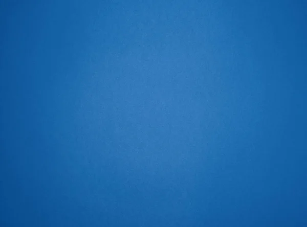 Leerer blauer Papierhintergrund mit Vignette, Platz für Schrift — Stockfoto