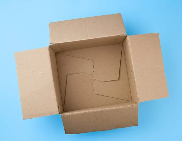 Abierto cuadrado vacío cartón marrón caja para embalaje y envío t —  Fotos de Stock