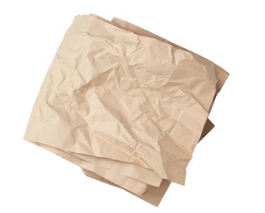 Beyaz arka grupta izole edilmiş katlanmış boş kahverengi kraft kağıt sayfası