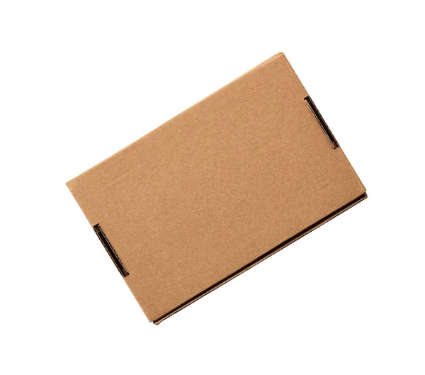 Gesloten rechthoekige kleine bruine doos voor het vervoer van goederen — Stockfoto