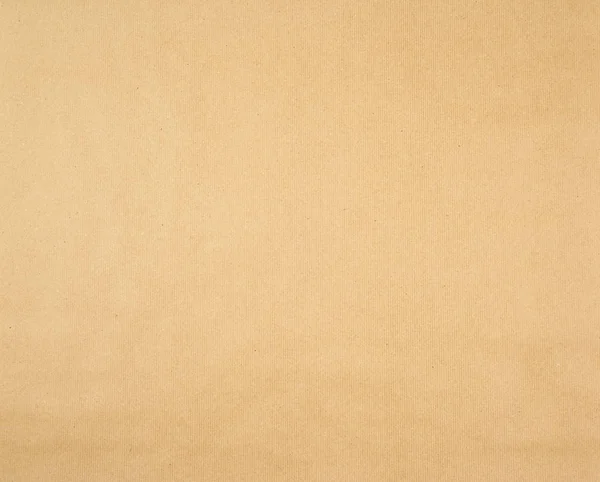 Texture of smooth brown kraft wrapping paper, full frame — Stock Photo, Image