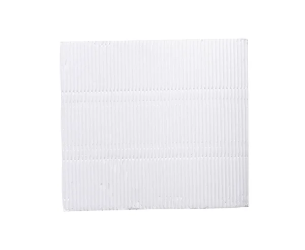 Foglio di carta ondulata bianco bianco su sfondo bianco — Foto Stock