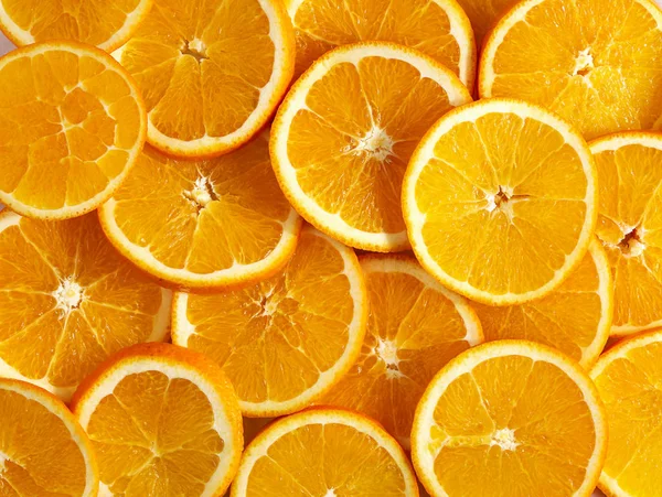 Textur der runden Scheiben der reifen saftigen Orange — Stockfoto